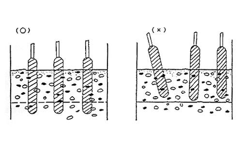 Revibration procedure for two-layer concrete placement