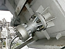 Example of a coke bunker material build-up removal system